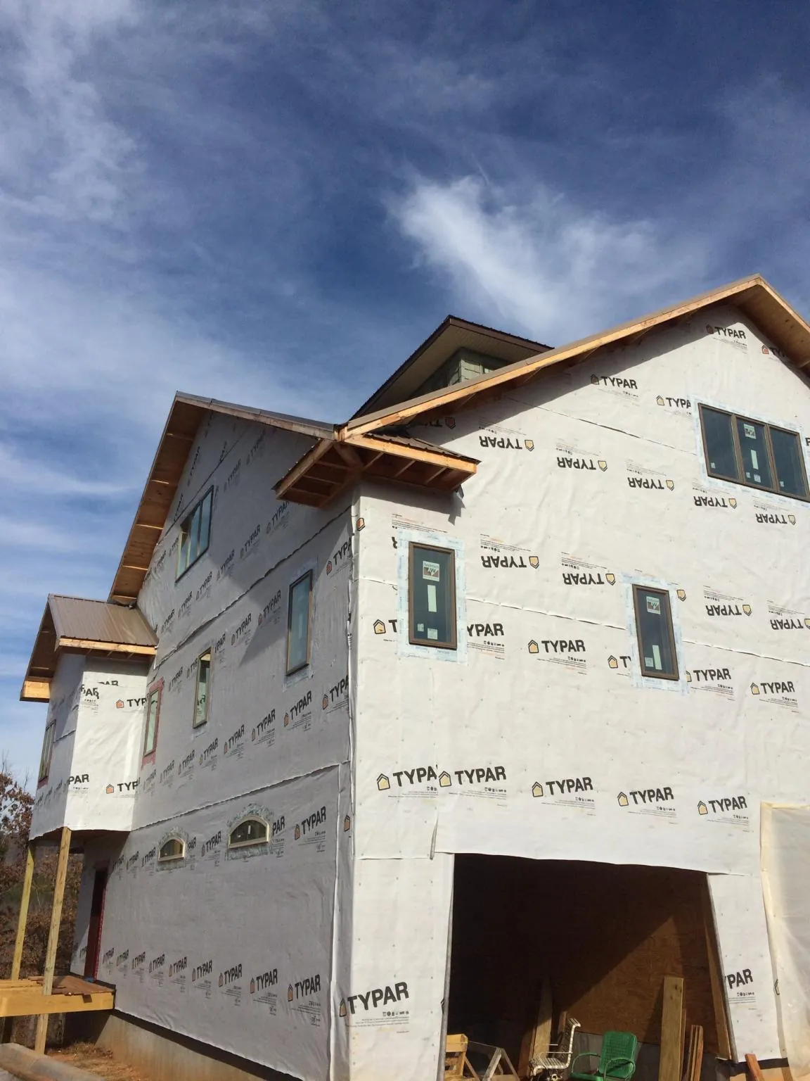 Stick built house wrapped in Typar with new roof framing and dormers in Sedalia